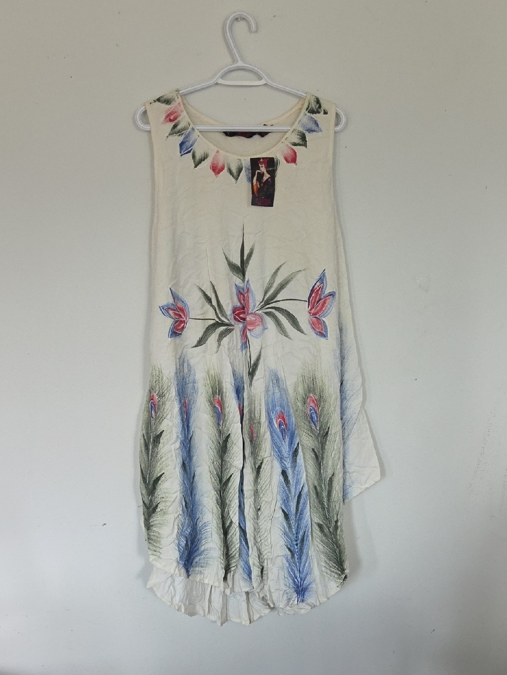 Cream Sleeveless High-Low Dress with Floral & Peacock Feather Print